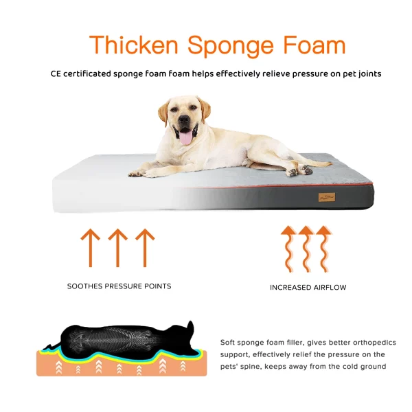 A dog stretching out on a spacious grey orthopedic dog bed