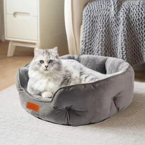 Grey pet bed, front view, showing plush interior