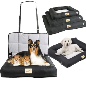 Dog resting comfortably on a black car seat bed inside a vehicle