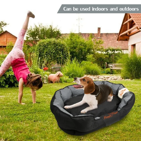 Side view of large soft dog bed showing supportive bolster and shape