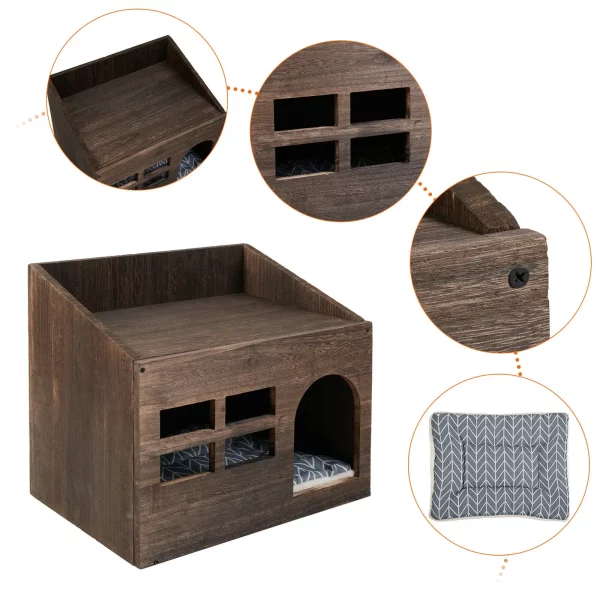 Close-up detail of the entrance hole and small interaction window on the cat house