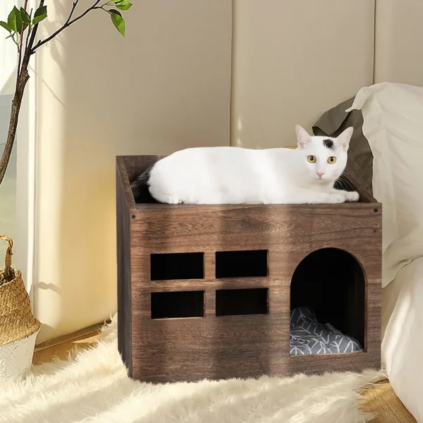 Solid wooden cat house, side profile revealing the enclosed litter box area