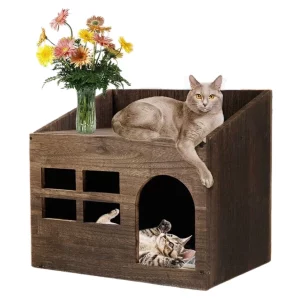 Solid wooden cat house, front view showing entrance hole and window