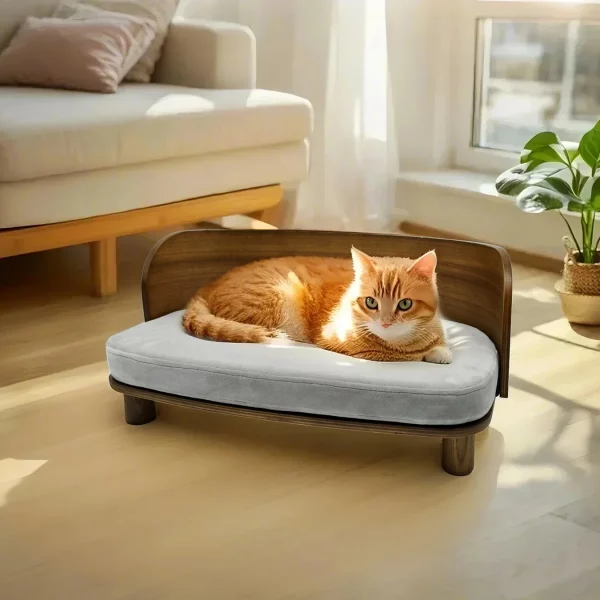 Detail of the soft grey cushion on the elevated cat bed