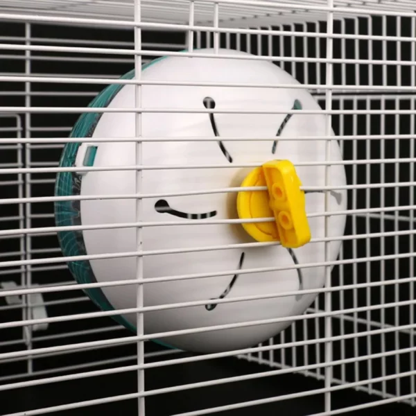 Hamster running on a silent exercise wheel, front view