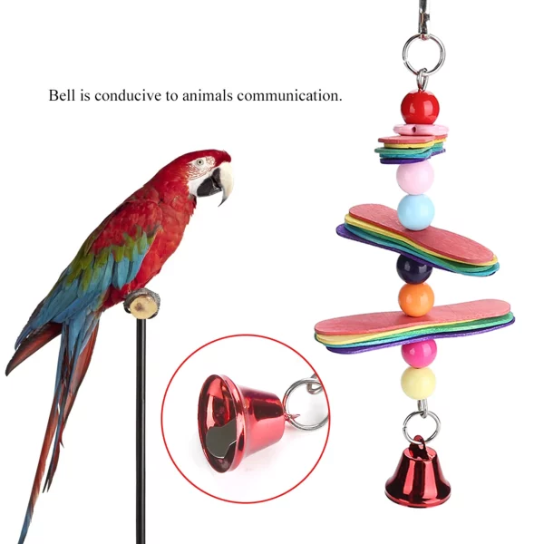 Detailed view of the bell on the parrot swing toy