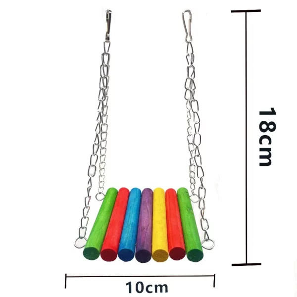 Various bird toys including a hammock and bell toy
