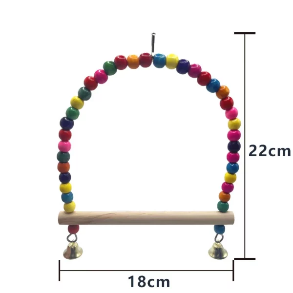 Close-up of a wooden bird swing with colourful beads