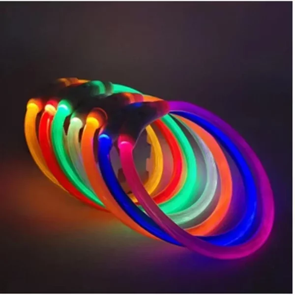 Close-up view of the glowing green fiber optic dog collar