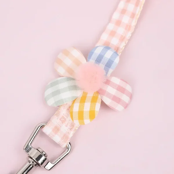 Side view of the small dog harness and leash set, highlighting the strap design.