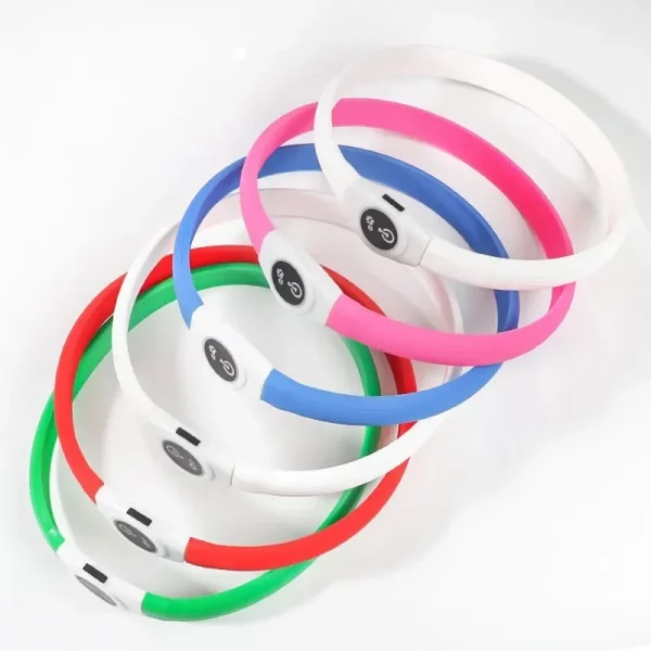 Close-up of the bright, colourful LED light strip on a dog collar.