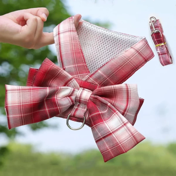 Detail of plaid pattern and bow on dog harness