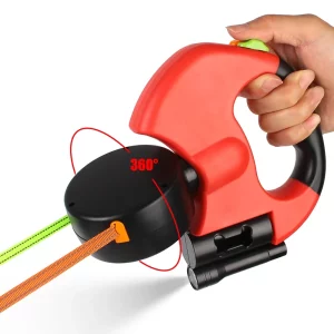 Close-up of dual dog leash handle with integrated flashlight and waste bag dispenser
