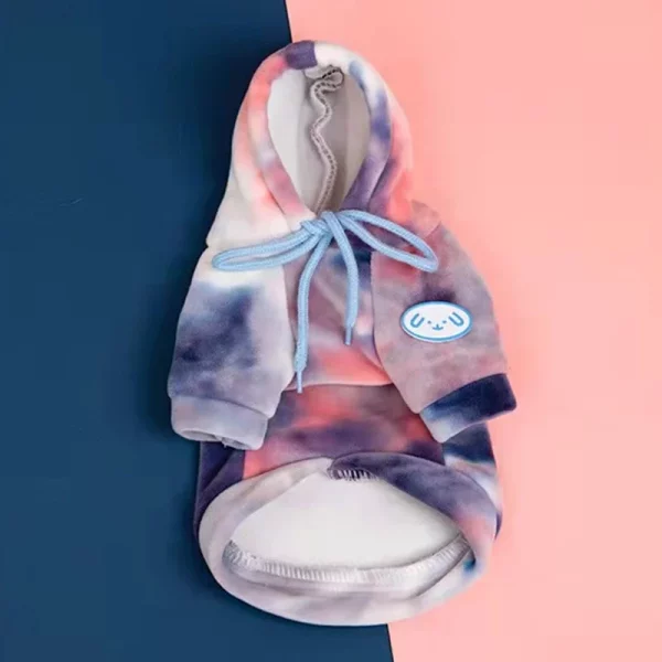 Dog wearing a purple tie-dye fleece hoodie, side profile