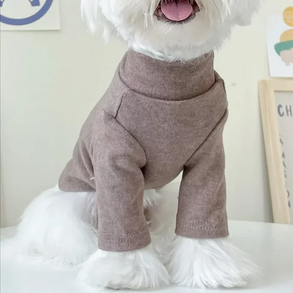 Soft dog t-shirt in light khaki, back view showing fit on a small dog