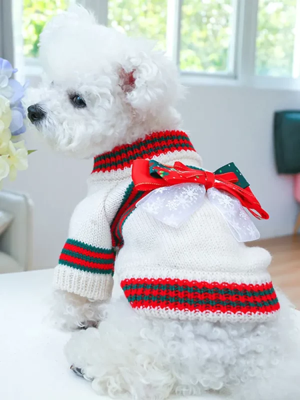 Side view of a dog wearing a festive knitted sweater