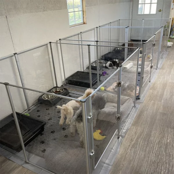 Large acrylic dog playpen, front view with puppy, indoor setting