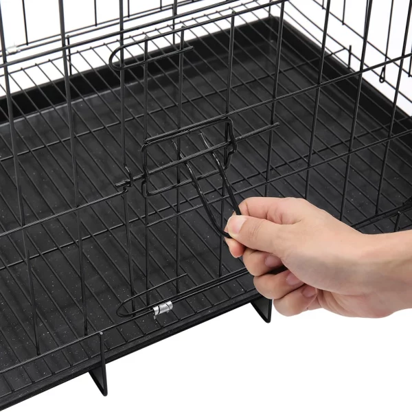 Close-up of the secure latch mechanism on the wire dog crate door