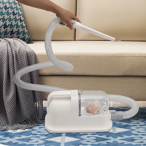 Side view of the pet hair grooming tool with dustbin