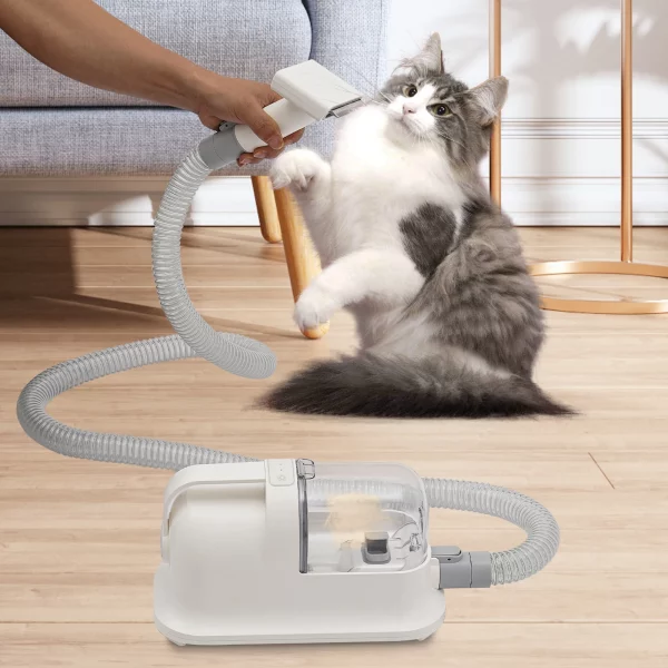 Close-up of the pet hair grooming tool's suction nozzle