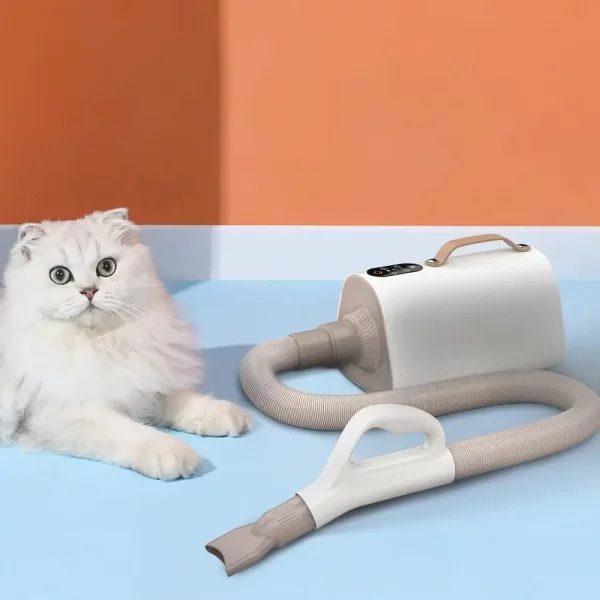 Close-up of the pet grooming dryer's interchangeable nozzles and flexible hose attachment
