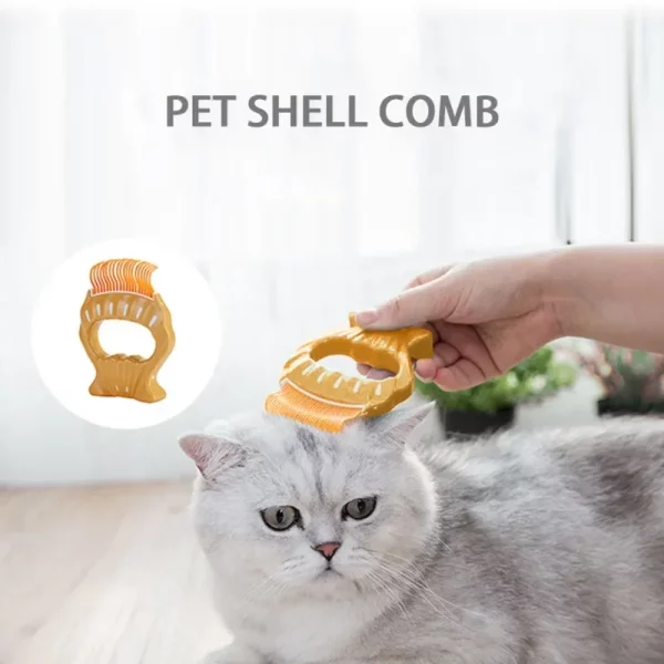 Ergonomic grip detail of the shell-shaped pet grooming comb