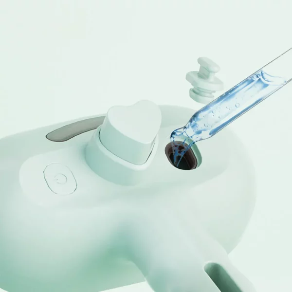Pink 3-in-1 cat steam brush highlighting the spray nozzle