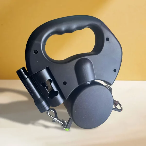 Close-up of the integrated LED light on the dual dog leash handle