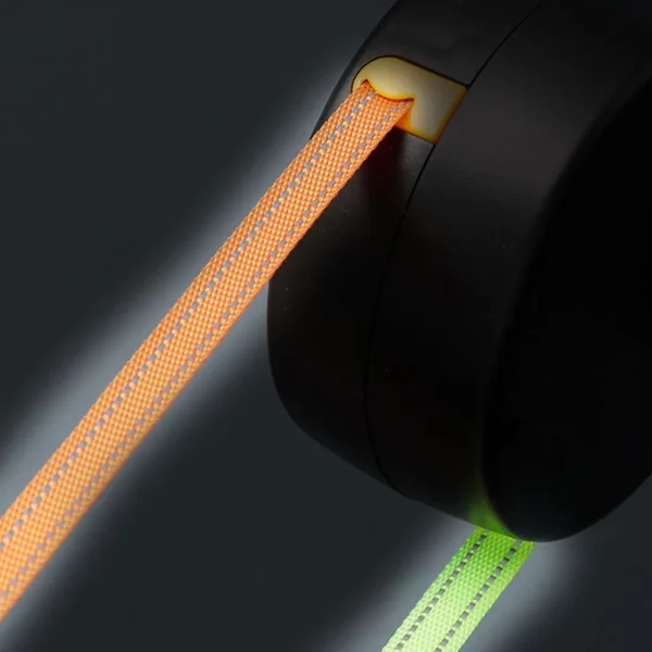 Dual dog leash, demonstrating the retractable function, ease of use