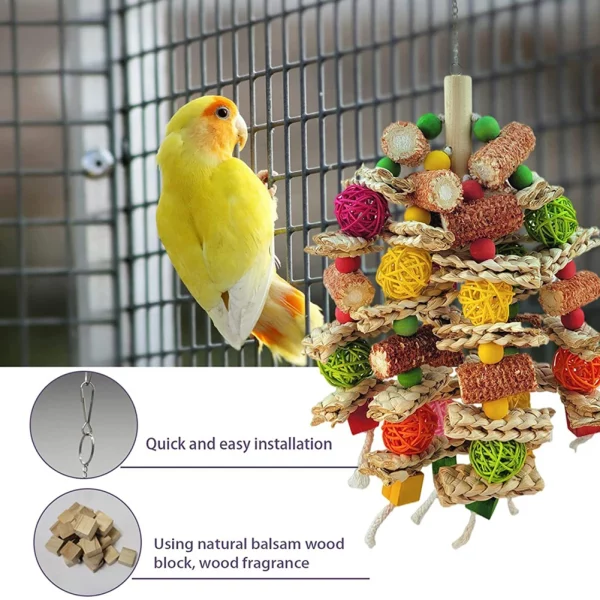 Multiple bird hanging chew toys arranged together in a cage setting