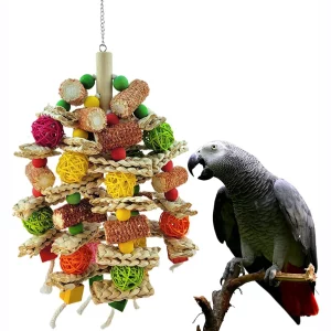 Bird hanging chew toy featuring rattan ball and corn cob sections