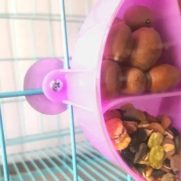 Side view of the durable plastic parrot foraging toy