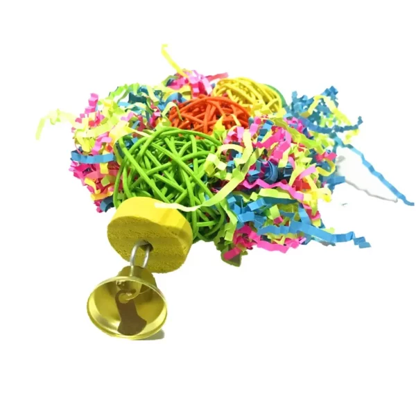 Bird using a hanging swing toy, showing engagement and play