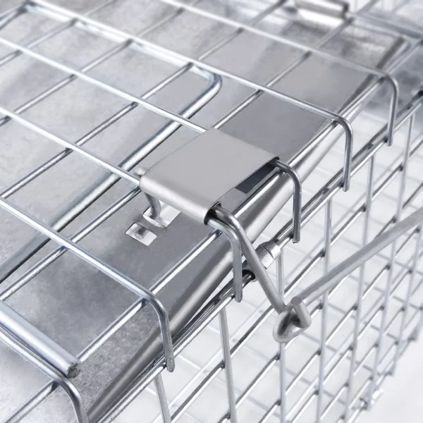 Humane rat trap cage, demonstrating handle guards for transport