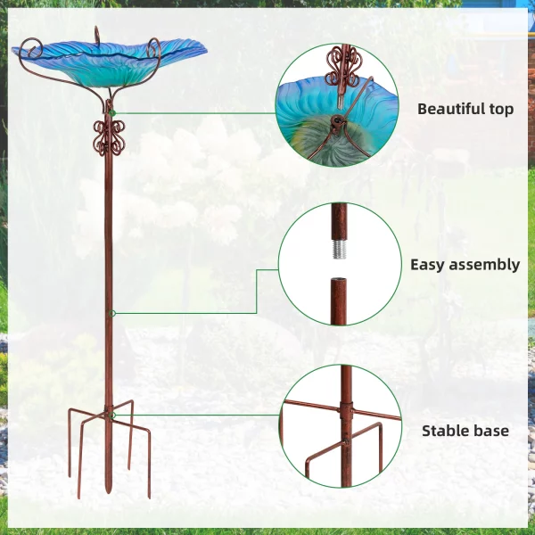 Side view of the glass bird bath, highlighting its depth and the stake's structure.