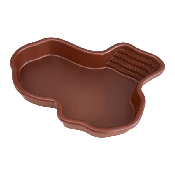 Reptile bathing pool and feeding dish from the side, showing its river shape.