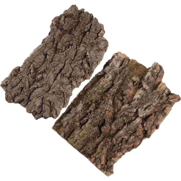 Terrarium setup featuring multiple bark ornaments for reptile enrichment