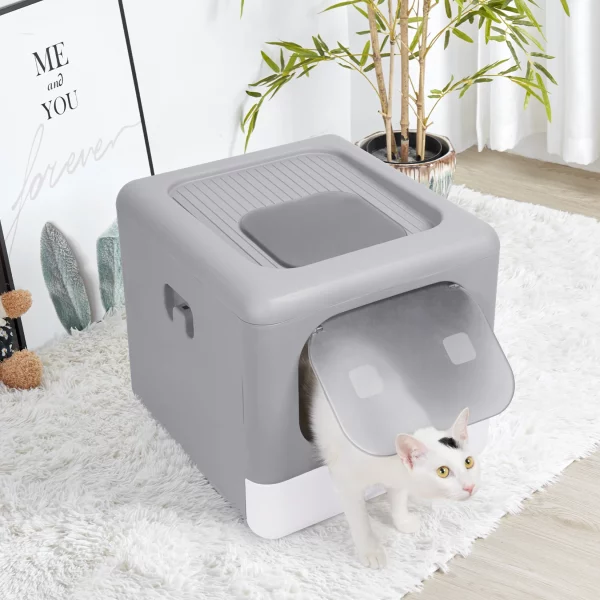 Cat using the top entry of the enclosed litter box.