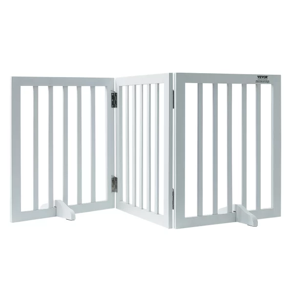 Freestanding dog gate set up in a white hallway, creating a pet barrier.