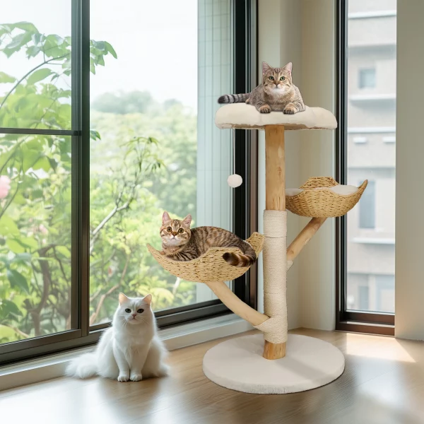 Cat resting on a plush perch of a tall cat tree