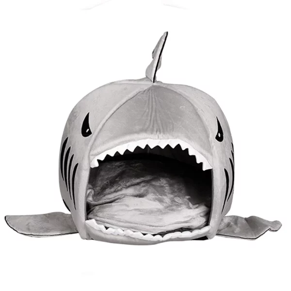Side view of the shark pet nest, highlighting its plush exterior.
