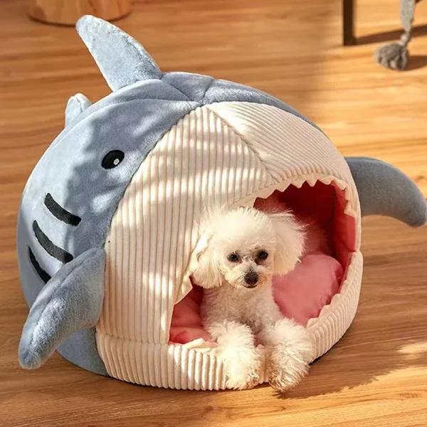 Close-up of the soft, padded cushion inside the shark cat bed