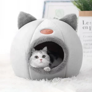 Winter cat bed front view, showing plush interior and cozy cave design