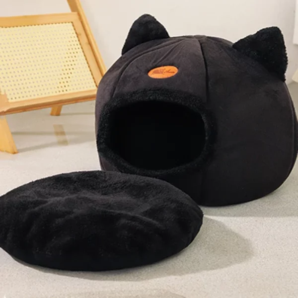 Close-up detail of the winter cat bed's soft, breathable fabric texture