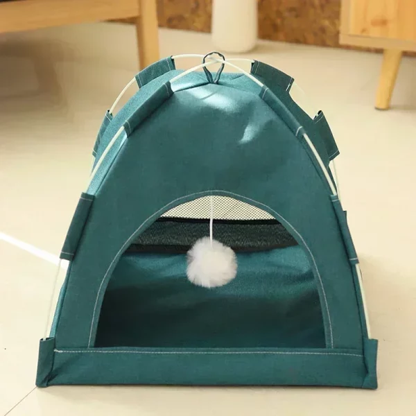 Green pet tent bed, angled shot showcasing the durable canvas exterior.