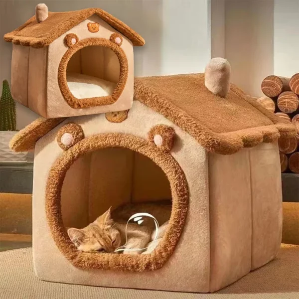 Side profile of the grey pet house opened, showing its cosy interior and removable cushion.