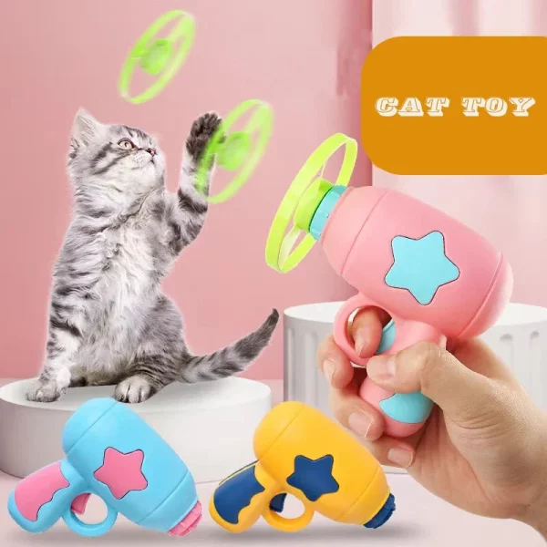 Cat batting at a flying disc launched by the toy