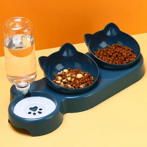 Close-up of the automatic water dispenser mechanism on the cat feeder