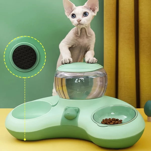 Cat drinking from the water dispenser bowl