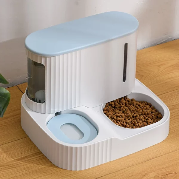 Pet actively using the dual bowl system, viewed from the side